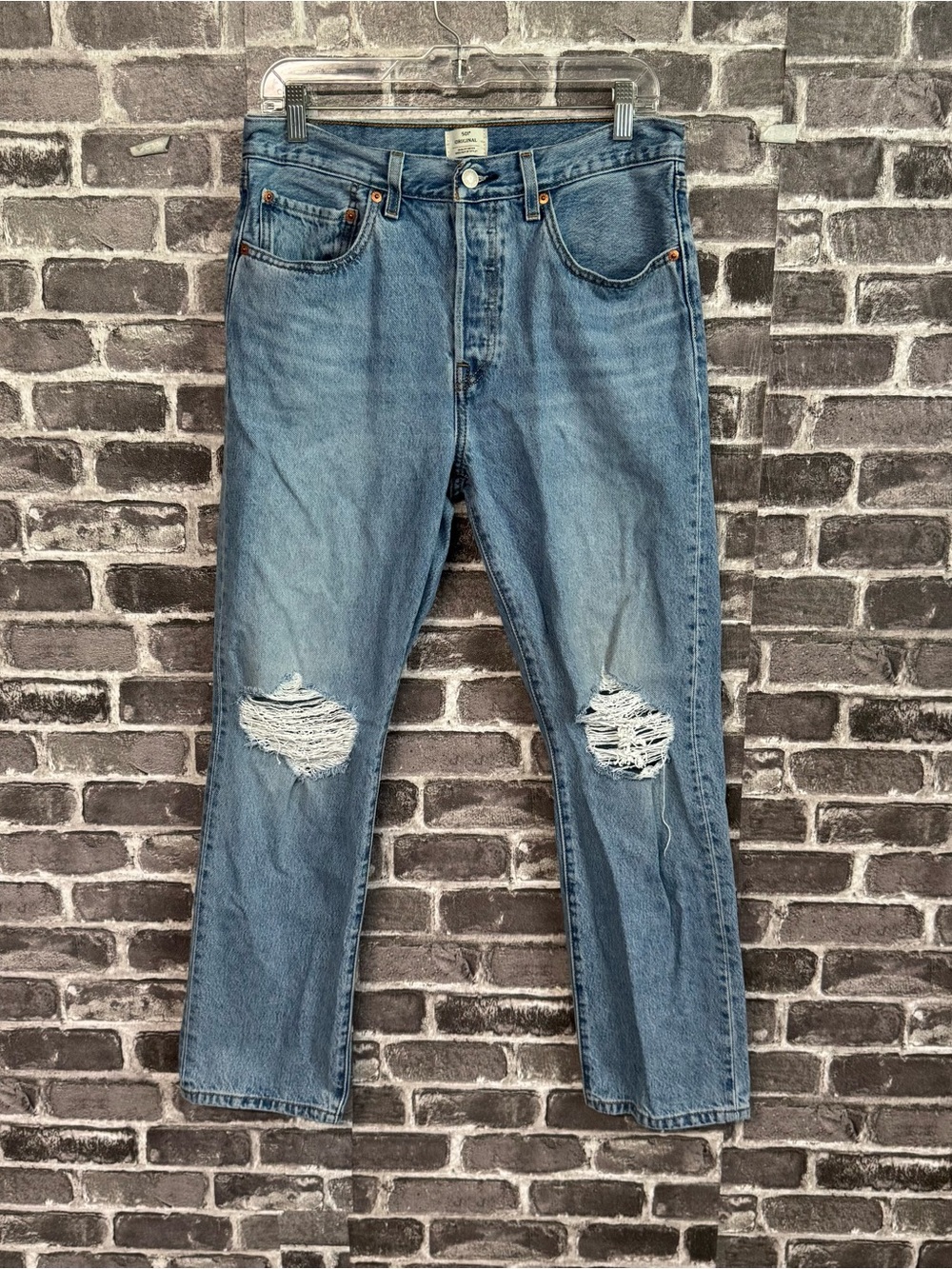 Levi’s 501 original straight leg jeans distressed knees